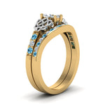 Load image into Gallery viewer, channel-band-marquise-cut-diamond-celtic-bridal-set-with-blue-topaz-in-yellow-gold-FDENS2255B2MQGICBLTOANGLE2-NL-YG_aa37fbdc-0d28-41ef-aaf3-f2f696123d7b?v=1756980487
