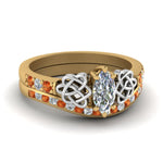 Load image into Gallery viewer, channel-band-marquise-cut-diamond-celtic-bridal-set-with-orange-sapphire-in-yellow-gold-FDENS2255B2MQGSAOR-NL-YG_1a733678-6db0-43a7-b35c-23229aa998ec?v=1756980487
