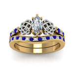 Load image into Gallery viewer, channel-band-marquise-cut-diamond-celtic-bridal-set-with-sapphire-in-yellow-gold-FDENS2255B2MQGSABLANGLE5-NL-YG_c8aca240-65ac-4f75-a552-d217fc277a1f?v=1756980487
