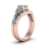 Load image into Gallery viewer, channel-band-princess-cut-diamond-celtic-bridal-set-with-blue-topaz-in-rose-gold-FDENS2255B2PRGICBLTOANGLE2-NL-RG_88777c56-8314-49fd-b827-92a02063ff3d?v=1756980497

