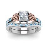 Load image into Gallery viewer, channel-band-princess-cut-diamond-celtic-bridal-set-with-blue-topaz-in-white-gold-FDENS2255B2PRGICBLTOANGLE5-NL-WG_887602c8-94fc-4450-92c2-d62e0a002f14?v=1756980499
