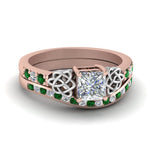Load image into Gallery viewer, channel-band-princess-cut-diamond-celtic-bridal-set-with-emerald-in-rose-gold-FDENS2255B2PRGEMGR-NL-RG_bb5ba67f-b1dd-431e-960f-31b228006e4f?v=1756980496
