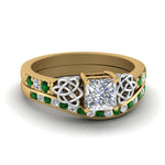 Load image into Gallery viewer, channel-band-princess-cut-diamond-celtic-bridal-set-with-emerald-in-yellow-gold-FDENS2255B2PRGEMGR-NL-YG_97dcf494-6896-4a22-a218-a353613ba3da?v=1756980497
