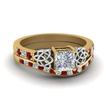 Load image into Gallery viewer, channel-band-princess-cut-diamond-celtic-bridal-set-with-ruby-in-yellow-gold-FDENS2255B2PRGRUDR-NL-YG_e4ab8278-3b62-4aaa-9502-5c400bc898bc?v=1756980497
