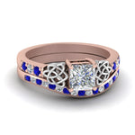Load image into Gallery viewer, channel-band-princess-cut-diamond-celtic-bridal-set-with-sapphire-in-rose-gold-FDENS2255B2PRGSABL-NL-RG_5f9d48fa-7c8a-4cc4-b987-c006cc126bbf?v=1756980497
