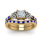 Load image into Gallery viewer, channel-band-princess-cut-diamond-celtic-bridal-set-with-sapphire-in-yellow-gold-FDENS2255B2PRGSABLANGLE5-NL-YG_6b8896fc-f7b5-401e-8fef-e32b5bf2c395?v=1756980496
