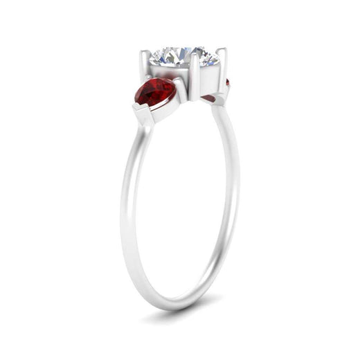 Classic Pear Three Stone Ring
