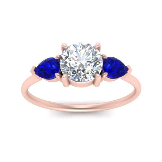 Classic Pear Three Stone Ring
