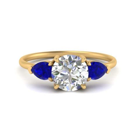 Classic Pear Three Stone Ring