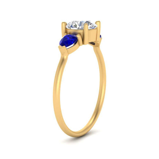 Classic Pear Three Stone Ring