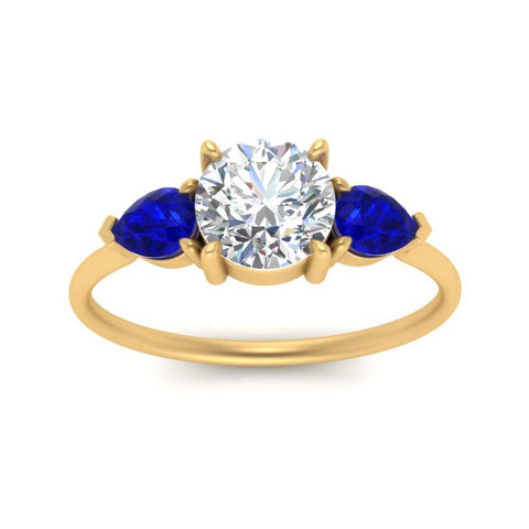 Classic Pear Three Stone Ring