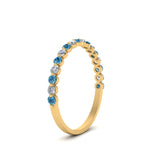 Load image into Gallery viewer, common-prong-thin-round-diamond-wedding-band-with-blue-topaz-in-FDENS3023BGICBLTO-NL-YG
