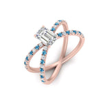 Load image into Gallery viewer, cross-band-emerald-cut-engagment-ring-with-blue-topaz-rose-gold-FD9890EMRGICBLTOANGLE2-NL-RG_5595e726-f8e7-41a0-84e2-e366f3ef980b.jpg?v=1760525879
