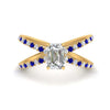 Load image into Gallery viewer, cross-band-emerald-cut-engagment-ring-with-sapphire-yellow-gold-FD9890EMRGSABL-NL-YG_0204e8d2-f2fd-4663-8ae2-70cd111160af.jpg?v=1760525946