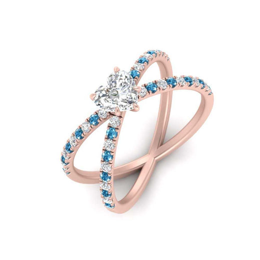 cross-band-heart-shaped-engagment-ring-with-blue-topaz-rose-gold-FD9890HTRGICBLTOANGLE2-NL-RG.jpg?v=1760525747
