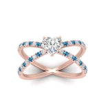 Load image into Gallery viewer, cross-band-heart-shaped-engagment-ring-with-blue-topaz-rose-gold-FD9890HTRGICBLTOANGLE5-NL-RG_423b2974-eae5-4d31-b6ba-6835562e855b.jpg?v=1760525890
