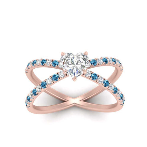cross-band-heart-shaped-engagment-ring-with-blue-topaz-rose-gold-FD9890HTRGICBLTOANGLE5-NL-RG.jpg?v=1760525747
