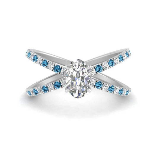 cross-band-oval-shaped-engagment-ring-with-blue-topaz-white-gold-FD9890OVRGICBLTO-NL-WG_1015e2d5-c9c6-4cf4-a6be-c97f9470a24b.jpg?v=1760525909