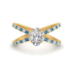 Load image into Gallery viewer, cross-band-oval-shaped-engagment-ring-with-blue-topaz-yellow-gold-FD9890OVRGICBLTO-NL-YG.jpg?v=1760525778
