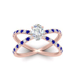 Load image into Gallery viewer, cross-band-oval-shaped-engagment-ring-with-sapphire-rose-gold-FD9890OVRGSABLANGLE5-NL-RG.jpg?v=1760525778