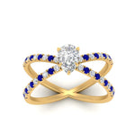 Load image into Gallery viewer, cross-band-pear-shaped-engagment-ring-with-sapphire-yellow-gold-FD9890PERGSABLANGLE5-NL-YG.jpg?v=1760525794