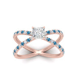 Load image into Gallery viewer, cross-band-princess-cut-engagment-ring-with-blue-topaz-rose-gold-FD9890PRRGICBLTOANGLE5-NL-RG_88004ec4-d323-482b-9818-aa1c42adf02d.jpg?v=1760525926
