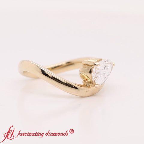 curve-wave-pear-shaped-solitaire-diamond-ring-in-yellow-gold-fdens11566R-yg-3