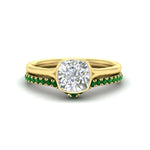 Load image into Gallery viewer, cushion-cut-bezel-solitaire-ring-with-emerald-band-in-yellow-gold-FD11229CUGEMGR-NL-YG.jpg?v=1758702831
