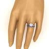 Load image into Gallery viewer, cushion-cut-bezel-solitaire-ring-with-sapphire-band-in-white-gold-FD11229CUGSABLHAND-NL-WG.jpg?v=1758702831
