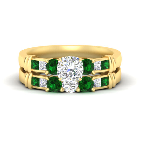 cushion-cut-bridal-ring-set-with-emerald-princess-channel-accents-in-yellow-gold-fdens286cugemgrsleep-nl-yg.jpg