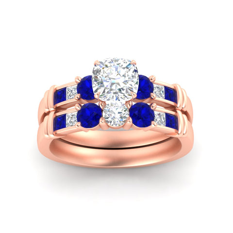 cushion-cut-bridal-ring-set-with-sapphire-princess-channel-accents-in-rose-gold-fdens286cugsablangle5-nl-rg.jpg