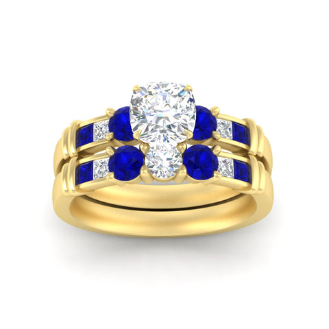 cushion-cut-bridal-ring-set-with-sapphire-princess-channel-accents-in-yellow-gold-fdens286cugsablangle5-nl-yg.jpg