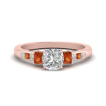 Load image into Gallery viewer, cushion-cut-channel-three-stone-diamond-engagement-ring-with-orange-sapphire-in-rose-gold-FDENS205CURGSAOR-NL-RG.jpg
