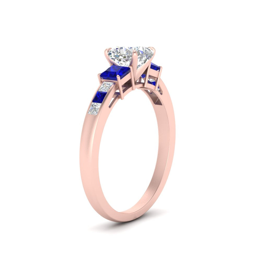 cushion-cut-channel-three-stone-diamond-engagement-ring-with-sapphire-in-rose-gold-FDENS205CURGSABL-NL-RG.jpg