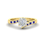 Load image into Gallery viewer, cushion-cut-diamond-swirl-channel-set-sapphire-wedding-ring-in-yellow-gold-FDENS4028CURGSABL-NL-YG_1a69bff7-ac16-42bf-9892-9e2075ae248d.jpg?v=1754996037
