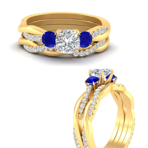 cushion-cut-three-stone-twisted-sapphire-wedding-band-in-yellow-gold-fdens3301cugsablangle3-nl-yg.jpg