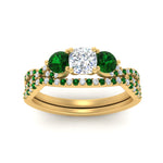 Load image into Gallery viewer, cushion-cut-twisted-floral-prong-emerald-wedding-set-in-yellow-gold-FD10257CUGEMGR-ANGLE5-NL-YG?v=1756359958
