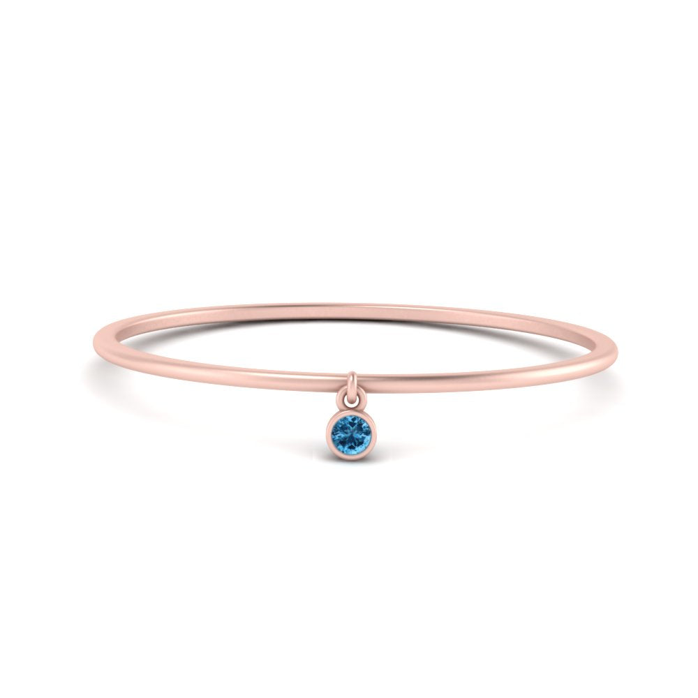 dangling-bezel-promise-blue-topaz-ring-in-rose-gold-FD9399RORGICBLTO-NL-RG.jpg