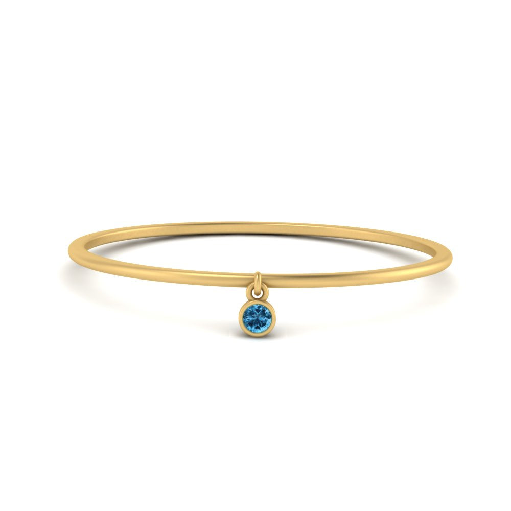 dangling-bezel-promise-blue-topaz-ring-in-yellow-gold-FD9399RORGICBLTO-NL-YG.jpg