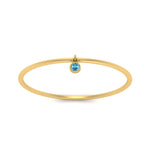Load image into Gallery viewer, dangling-bezel-promise-blue-topaz-ring-in-yellow-gold-FD9399RORGICBLTO-NL-YG.jpg
