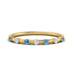 Load image into Gallery viewer, delicate-blue-topaz-stacking-band-in-yellow-gold-FD9811BGICBLTO-NL-YG.jpg
