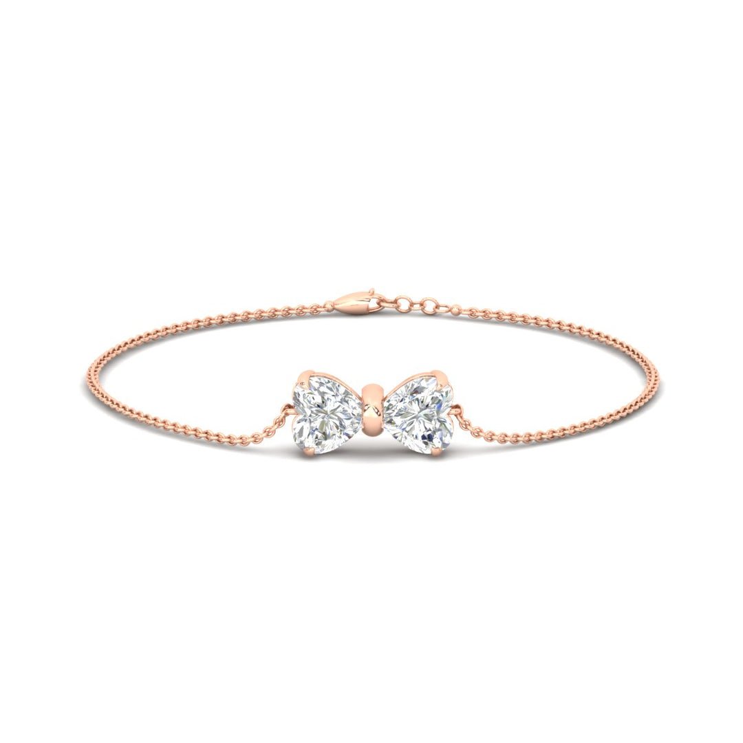 delicate-bow-diamond-charm-bracelet-in-rose-gold-fdbrc8336angle1-nl-rg