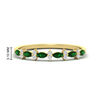 Load image into Gallery viewer, delicate-emerald-marquise-and-round-stack-wedding-band-in-yellow-gold-FD11310BGEMGRANGLE3-NL-YG.jpg
