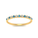 Load image into Gallery viewer, diamond-bezel-set-thin-stack-band-with-blue-topaz-in-yellow-gold-FDWB1408BGICBLTOANGLE3-NL-YG.jpg
