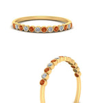 Load image into Gallery viewer, diamond-bezel-set-thin-stack-band-with-orange-sapphire-in-yellow-gold-FDWB1408BGSAORANGLE3-NL-YG.jpg
