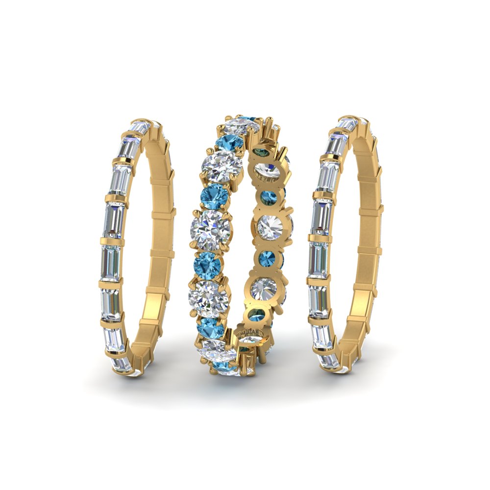 diamond-eternity-stacking-band-with-baguette-and-blue-topaz-in-yellow-gold-FD9119GICBLTOANGLE3-NL-YG.jpg