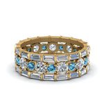 Load image into Gallery viewer, diamond-eternity-stacking-band-with-baguette-and-blue-topaz-in-yellow-gold-FD9119GICBLTOANGLE3-NL-YG.jpg
