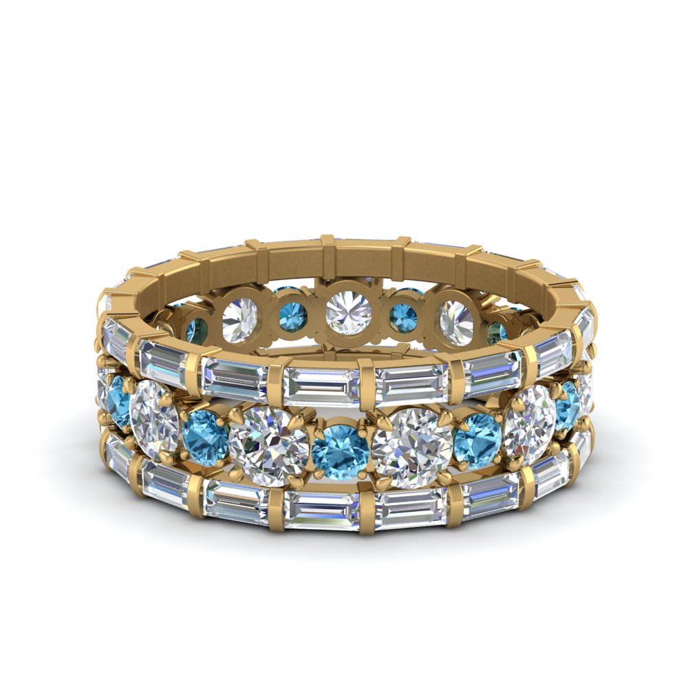diamond-eternity-stacking-band-with-baguette-and-blue-topaz-in-yellow-gold-FD9119GICBLTOANGLE3-NL-YG.jpg