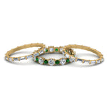 Load image into Gallery viewer, diamond-eternity-stacking-band-with-baguette-and-emerald-in-yellow-gold-FD9119GEMGRANGLE3-NL-YG.jpg

