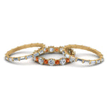 Load image into Gallery viewer, diamond-eternity-stacking-band-with-baguette-and-orange-sapphire-in-yellow-gold-FD9119GSAORANGLE3-NL-YG.jpg
